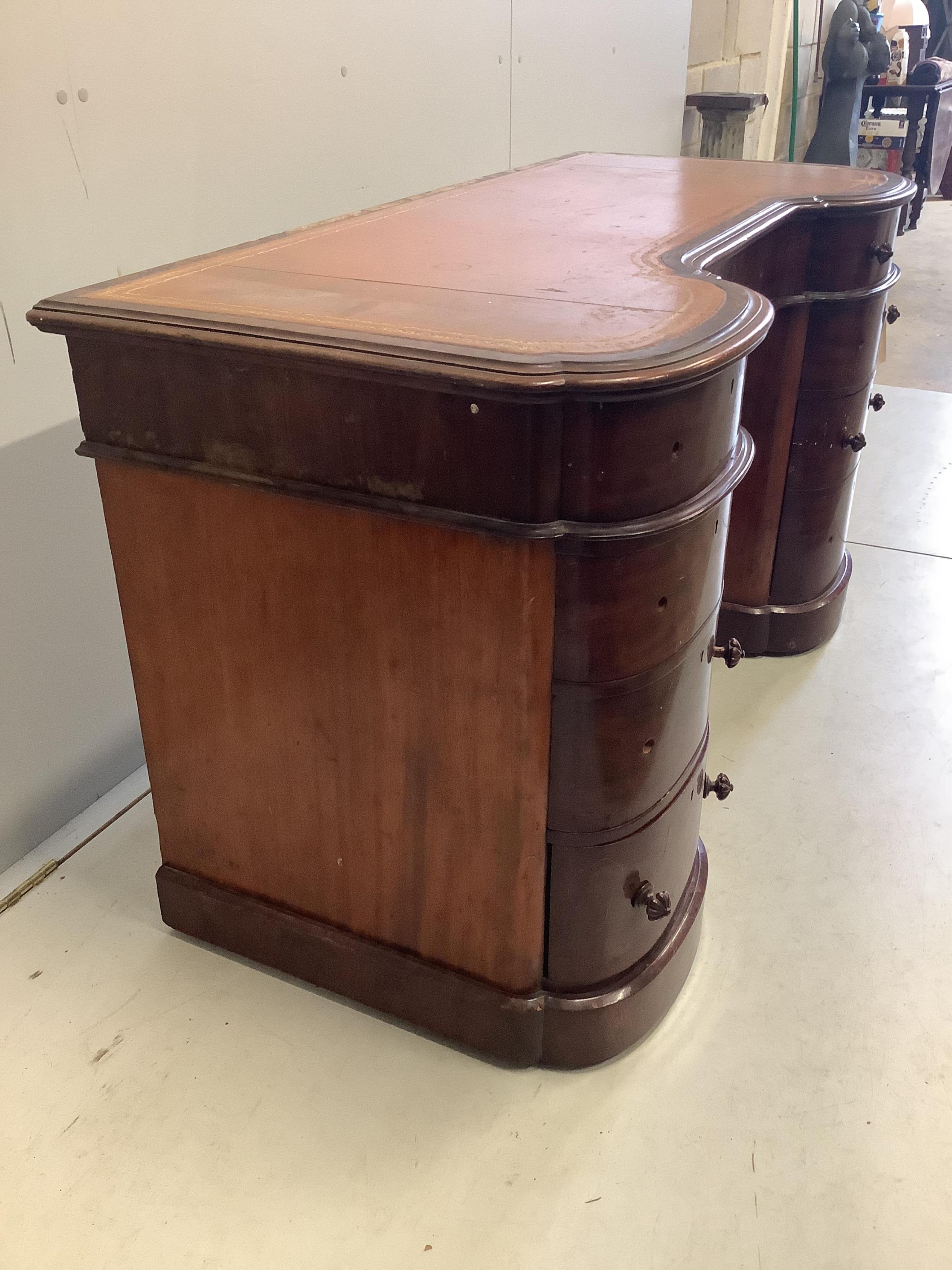 A Victorian mahogany bow front pedestal desk, width 138cm, depth 62cm, height 76cm. Condition - poor